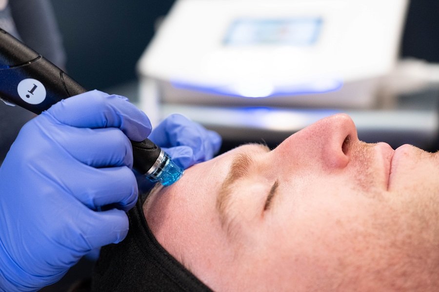 Man receiving hydrafacial at Restore South Mount Pleasant