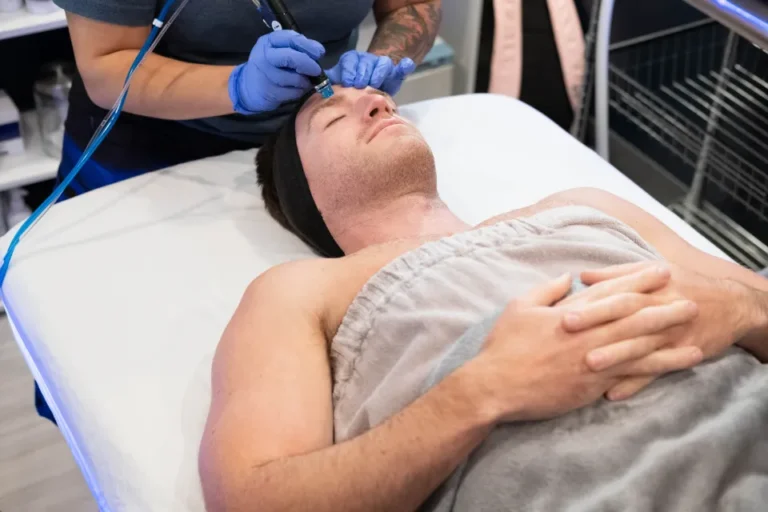 Man laying down during hydrafacial.